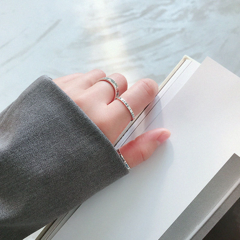 Adjustable 925 sterling silver Greek alphabet ring by silverbene with intricate letter detailing.