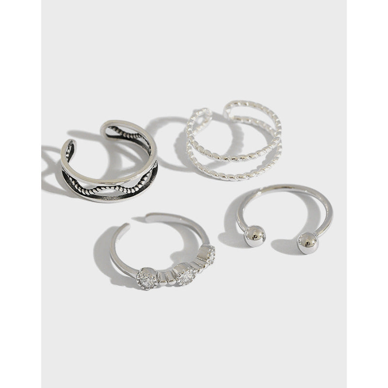Twisted beads CZ ring in 925 sterling silver, adjustable design showcasing intricate detailing and sparkling stones.