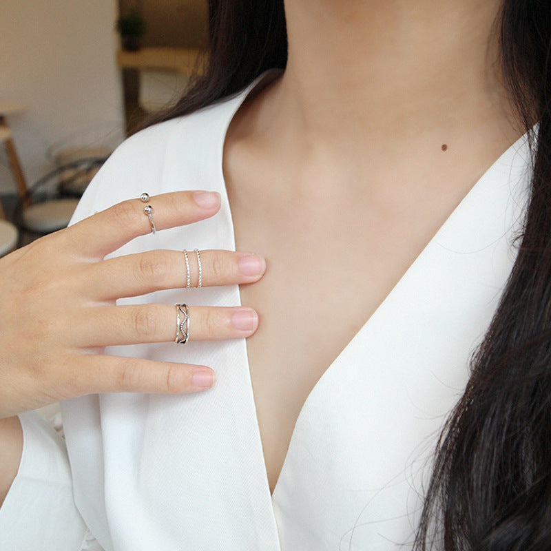 Twisted beads CZ ring in 925 sterling silver, adjustable design by silverbene, showcasing intricate bead details.