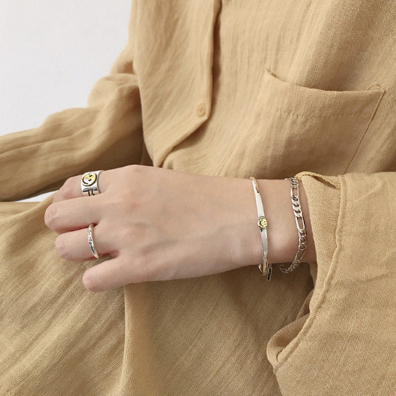 Silverbene Smile Gesicht Bangle in open design, crafted from 925 sterling silver, showcasing a playful smile motif.