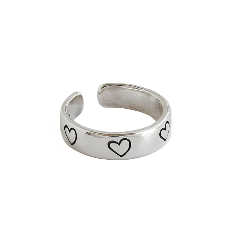 Vintage black heart ring in 925 sterling silver, adjustable design by silverbene, showcasing detailed craftsmanship.