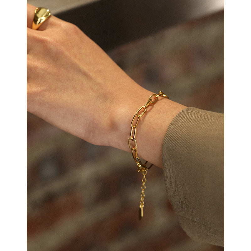 Modern minimalist hollow chain armband made of 925 sterling silver by silverbene, showcasing its sleek design and shine.