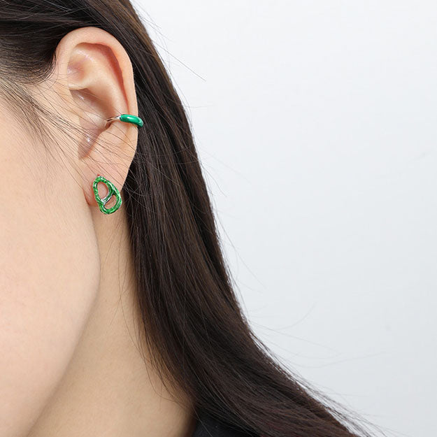 Asymmetrical green spiral earrings made of 925 sterling silver by silverbene, featuring a unique design and elegant finish.