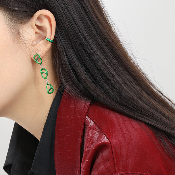 Asymmetrical green spiral earrings in 925 sterling silver by silverbene, showcasing intricate design and elegant style.