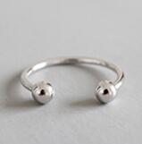 Twisted beads CZ ring in 925 sterling silver, adjustable design, showcasing intricate details and sparkling stones.