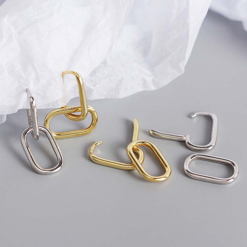 Geometric ellipse earrings in 925 sterling silver by silverbene, showcasing a modern design and elegant shine.